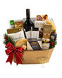 Deck the Halls luxury Christmas gift basket with red wine, Guylian Belgian chocolates, Lindt dark chocolate, Brie, pistachios and gourmet treats in a hammered gold basket with red bow.