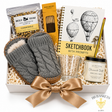 Cozy Night In self-care gift set with Beez Teaz chamomile tea, knitted slipper socks, local candle, incense, glass mug and sketchbook by BB Baskets Calgary