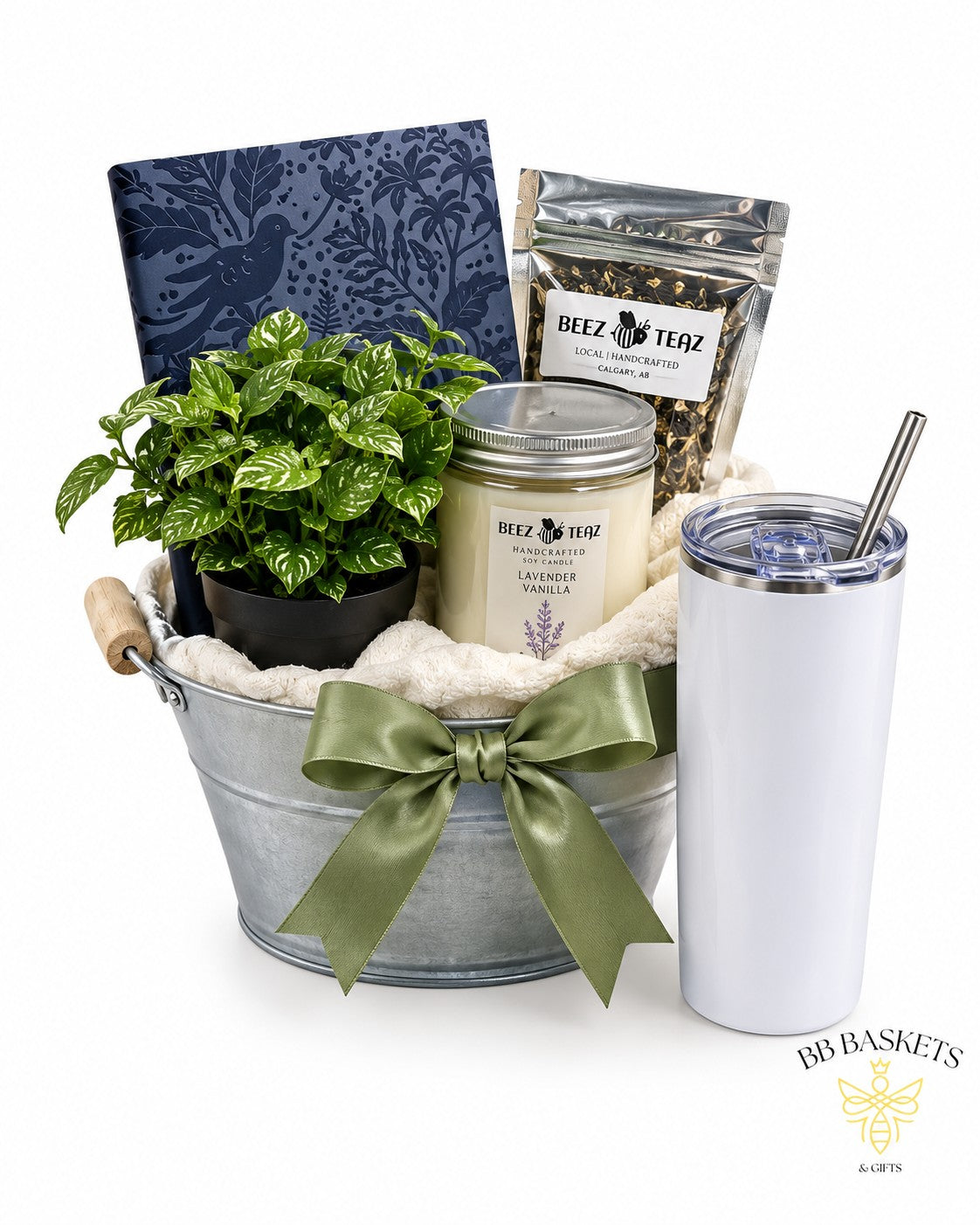 Rest and Restore self-care gift basket with plush throw blanket, local loose-leaf tea, candle, journal, tumbler and faux plant by BB Baskets Calgary