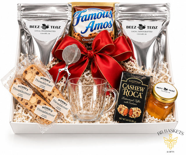Steeped tea gift basket with Beez Teaz loose-leaf teas, mug, tea steeper, honey, Cashew Roca and cookies by BB Baskets Calgary
