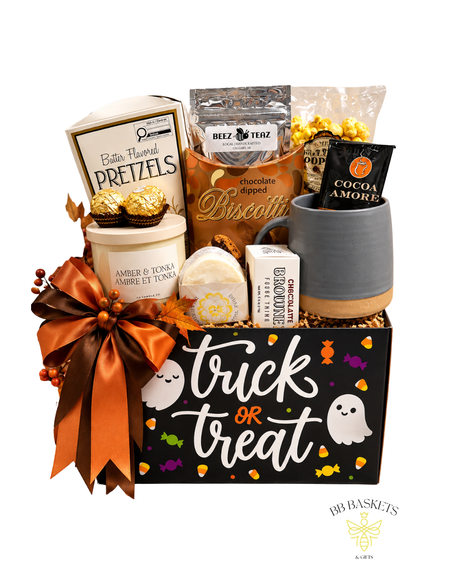 Boo-tiful Treats Halloween gift basket featuring Beez Teaz loose-leaf tea, gourmet pretzels, chocolate biscotti, popcorn, hot cocoa, ceramic mug, candle and chocolates in a Trick or Treat gift box.