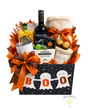 Halloween Boo Basket featuring red wine, cozy blanket, gourmet chocolates, popcorn, candle, hot cocoa and tumbler in a festive ghost-themed gift box.