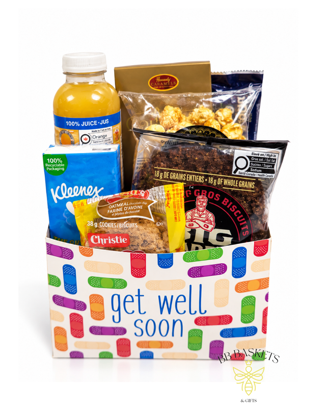 The Pick Me Up Gift Basket featuring orange juice, gourmet cookies, caramel popcorn, caramels and tissues in a colorful Get Well Soon box.